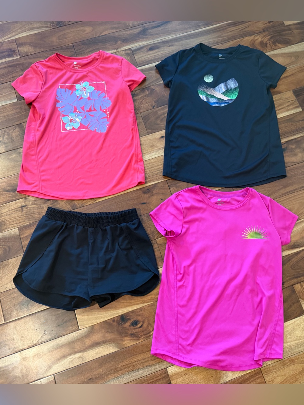 All in Motion lot of 4 girl large athletic tops and shorts